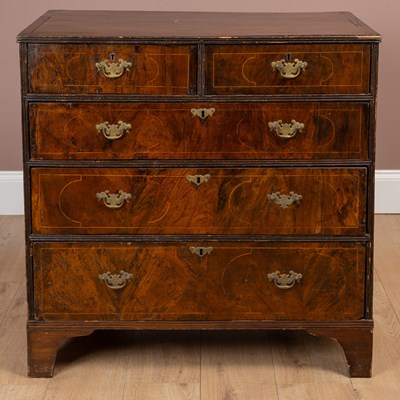 Lot 214 - An 18th century and later walnut chest of two short and three long drawers