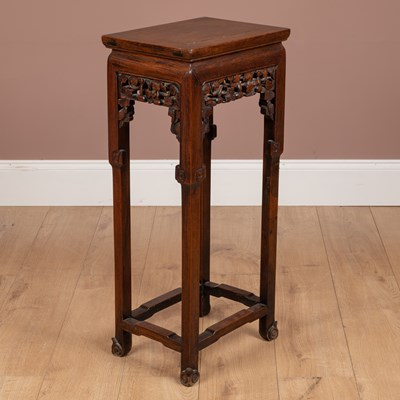 Lot 1192 - A Chinese hardwood jardinière stand