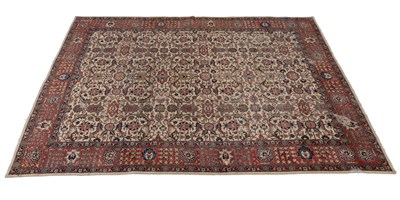 Lot 236 - A 20th century cream ground Tabriz rug