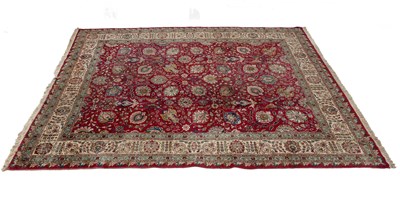 Lot 412 - A mid 20th century hand woven Tabriz carpet