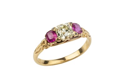 Lot 106 - A ruby and diamond three stone ring, the...