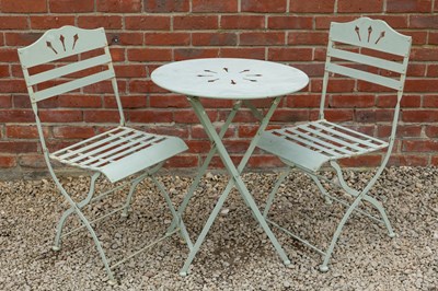 Lot 1275 - A cafe table and chairs