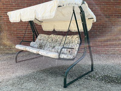 Lot 1244 - A garden swing seat