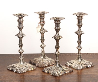 Lot 310 - Set of four George III silver candlesticks...