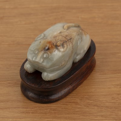 Lot 212 - Greyish green jade oval pebble Chinese, late...