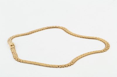 Lot An 18ct gold necklace, composed of flattened...