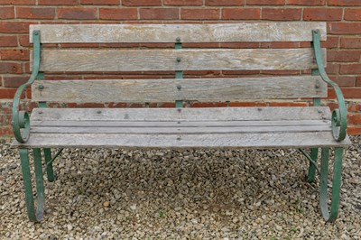 Lot 1356 - An antique green painted wrought iron bench