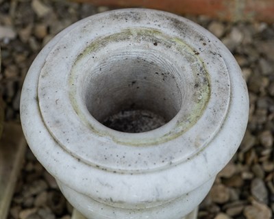 Lot 1233 - Two similar marble urns