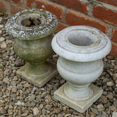 Lot 1233 - Two similar marble urns