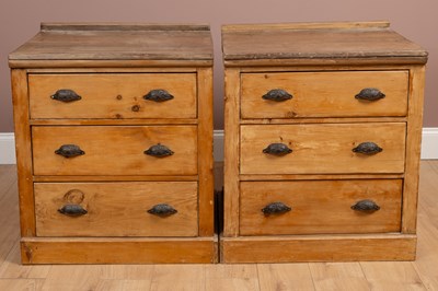 Lot 242 - A pair of pine chests of three drawers