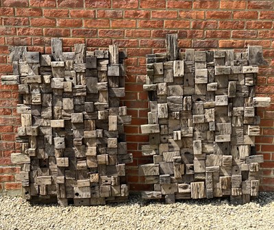 Lot 1309 - A pair of large teak garden blockwork panels