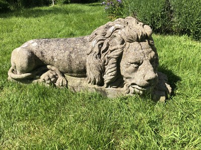 Lot 1256 - A large 20th century sculpture of a resting lion