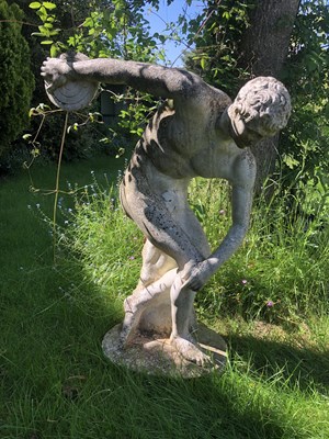 Lot 1365 - A cast reconstituted stone discobolus