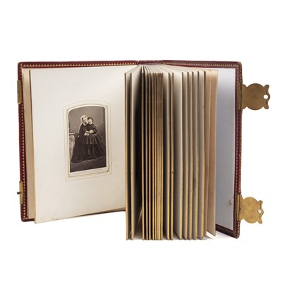 Lot 557 - A Victorian red morocco photograph album, 19th...