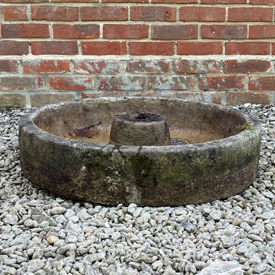 Lot 1258 - A cast reconstituted stone circular fountain base