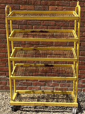 Lot 1266 - A yellow painted iron five-tier rack