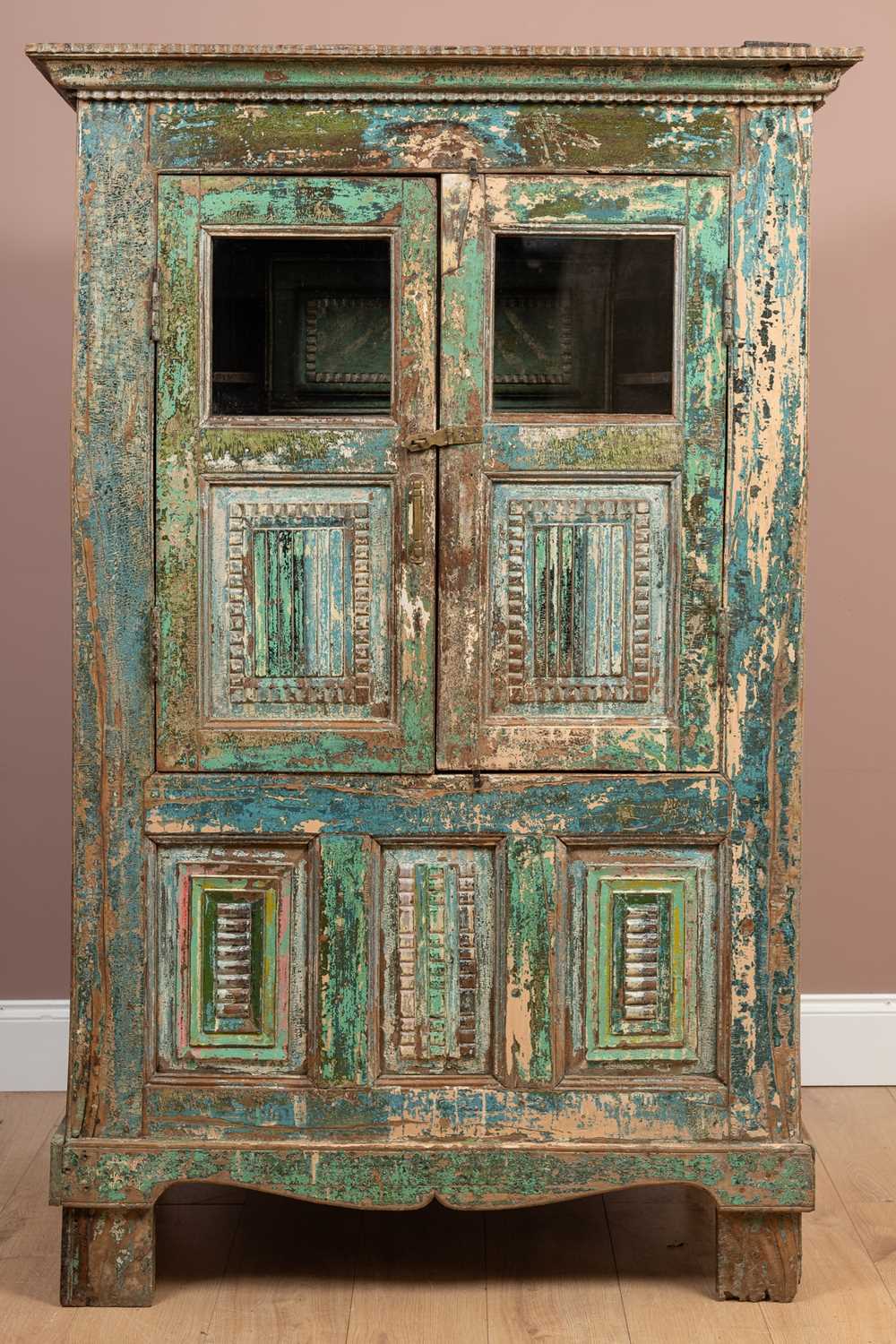 Lot 470 - A painted Indian cupboard