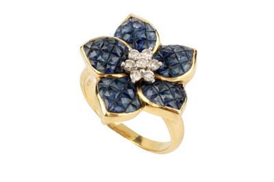 Lot 173 - A sapphire and diamond cluster ring, of...