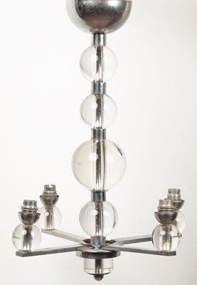 Lot 1093 - A chrome and glass hanging light fitting in the manner of Jacques Adnet