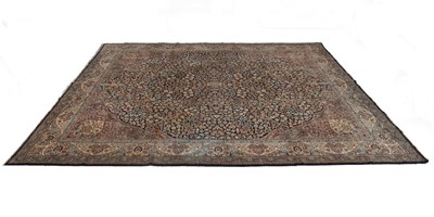 Lot 474 - A large hand-woven late 20th century Kashan rug