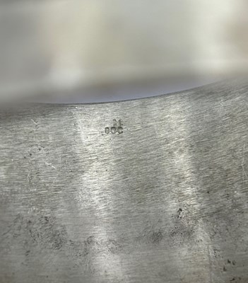 Lot 227 - A silver bangle by Breon O'Casey, the linear...