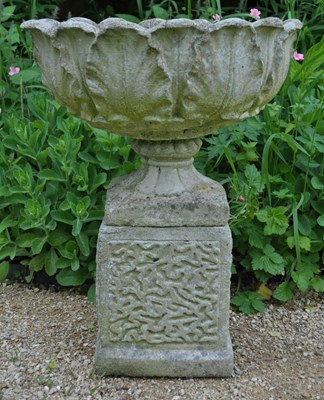 Lot 1287 - A garden urn on a plinth base