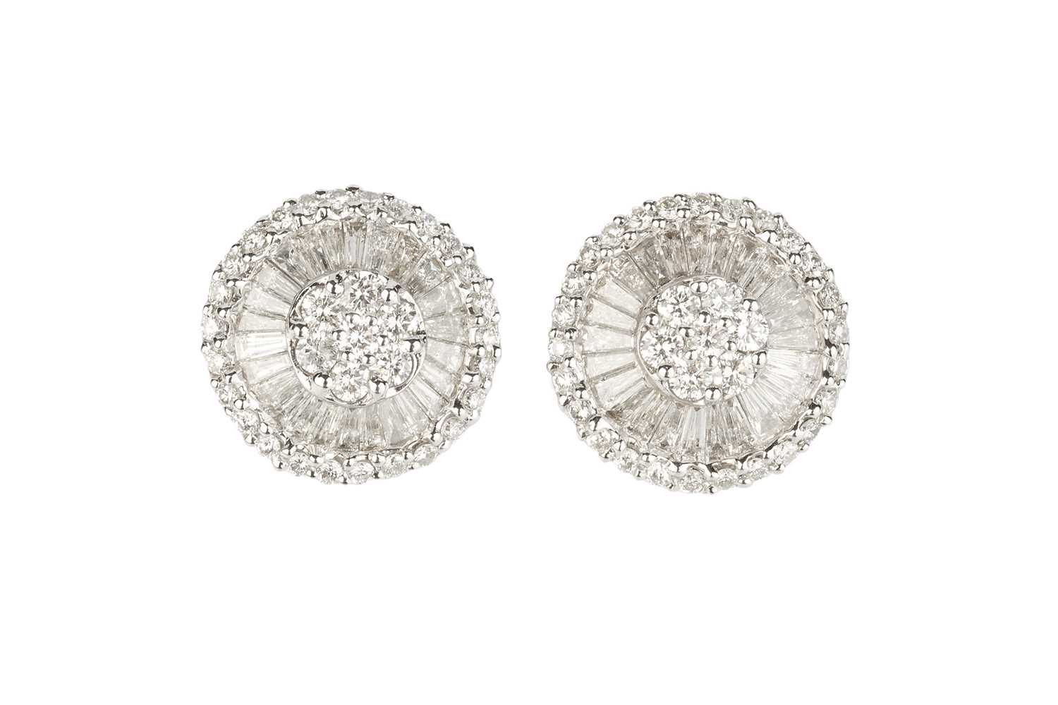 Lot 259 - A pair of diamond cluster ear studs, each...