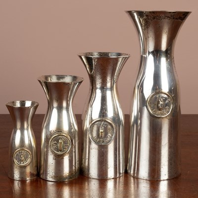 Lot 1060 - A set of four Italian silver plated measures