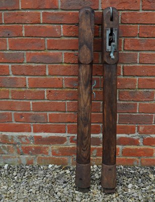 Lot 1238 - A pair of traditional wooden tennis court net posts