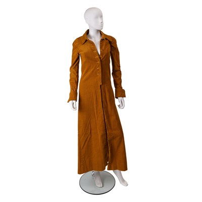 Lot 519 - A 1960's Biba burnt orange long corduroy coat,...