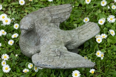 Lot 1250 - A lead garden ornament in the form of a dove