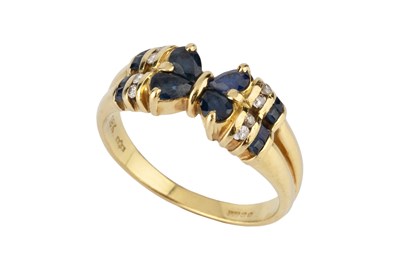 Lot 175 - A sapphire and diamond dress ring, set with...