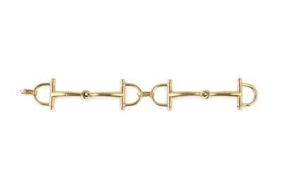 Lot 254 - A snaffle-link bracelet by Hermès, the jointed...