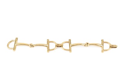 Lot 254 - A snaffle-link bracelet by Hermès, the jointed...