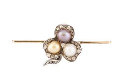 Lot 243 - A pearl and diamond bar brooch, designed as a...