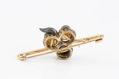 Lot 243 - A pearl and diamond bar brooch, designed as a...