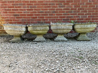 Lot 1237 - A group of four square garden urns or planters