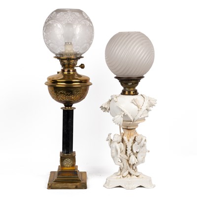 Lot 388 - Two 19th century oil lamps converted for electricity