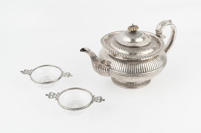 Lot 249 - A William IV silver teapot, with lobed and...