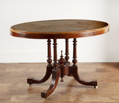 Lot 42 - Oval walnut inlaid breakfast table with a...