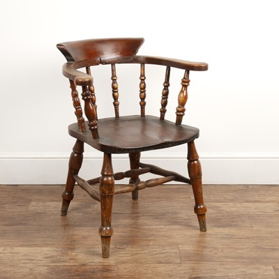 Lot 43 - Elm and ash smokers bow armchair Victorian,...