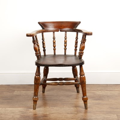 Lot 43 - Elm and ash smokers bow armchair Victorian,...