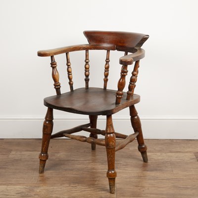 Lot 43 - Elm and ash smokers bow armchair Victorian,...