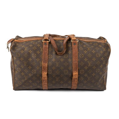 Lot 509 - A Louis Vuitton Paris vintage travel bag in...