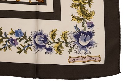 Lot 585 - A ‘Les Jardiniers Du Roy’ silk scarf by Hermès,...