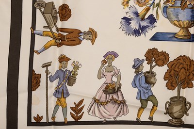 Lot 585 - A ‘Les Jardiniers Du Roy’ silk scarf by Hermès,...