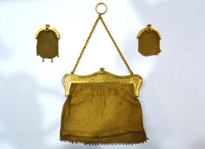 Lot 322 - Three yellow metal purses the largest stamped '...