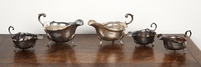 Lot 447 - Group of five silver sauce boats of various...