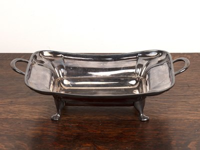 Lot 324 - Silver twin handled dish  standing on four...