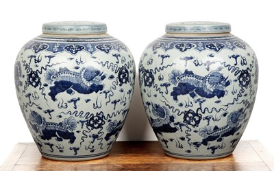 Lot 58 - Pair of large blue and white lidded jars...
